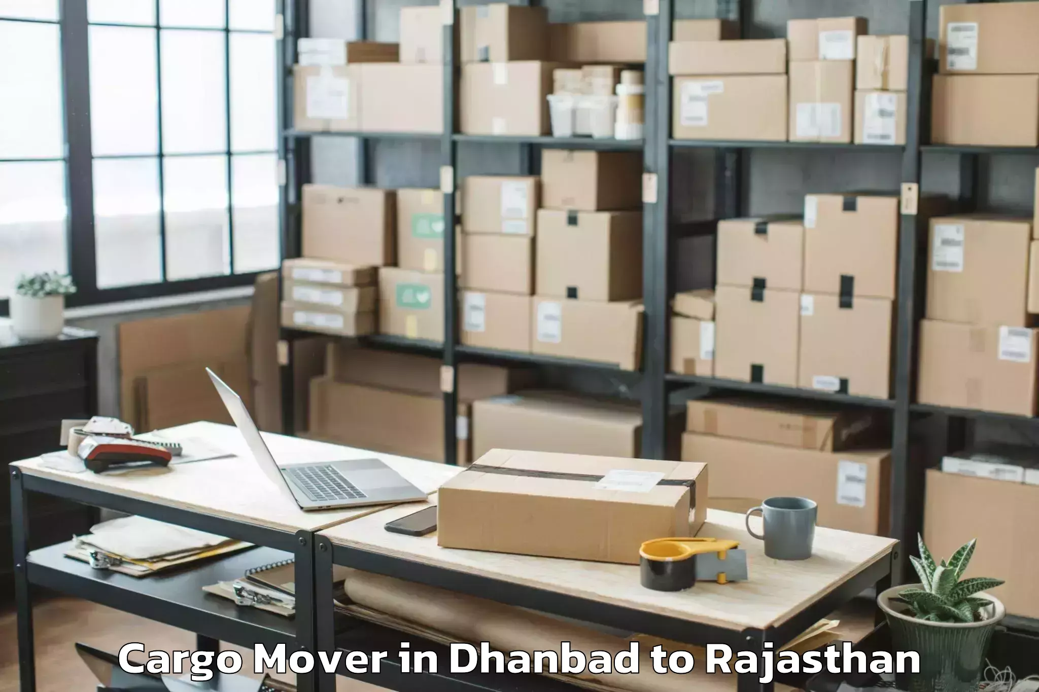 Professional Dhanbad to Tantia University Sri Ganganag Cargo Mover